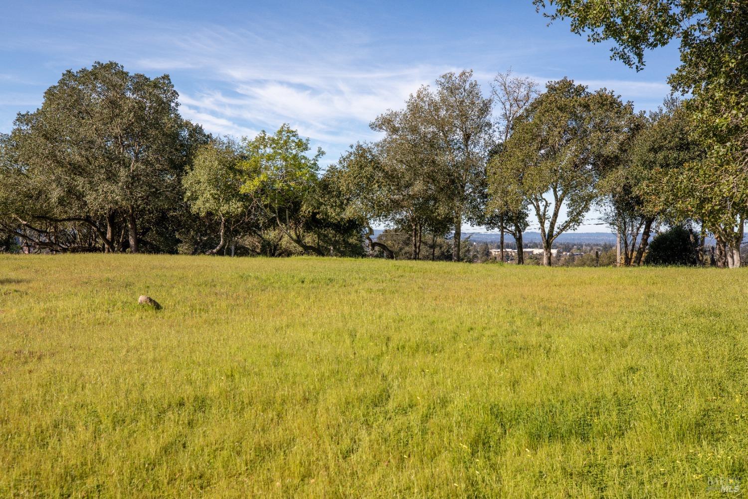 a view of swimming pool with an outdoor space and seating area