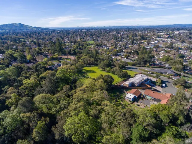 an aerial view of a city with lots of residential buildings