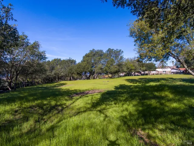 a view of swimming pool with an outdoor space and seating area