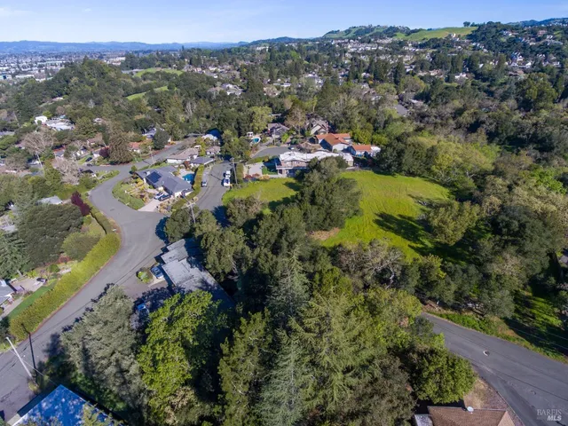 an aerial view of a city with lots of residential buildings