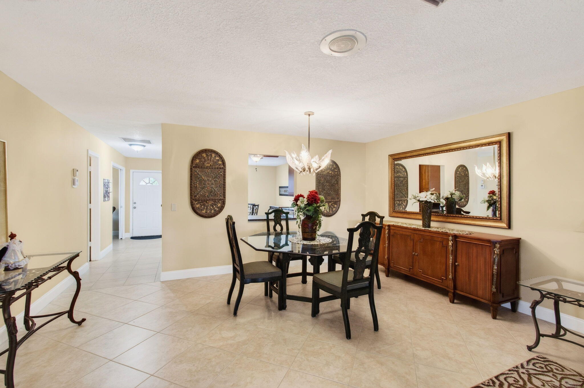 5263 Privet Place, Unit D Delray Beach, FL 33484 - Photo 15 of 60 a dining room with furniture and window