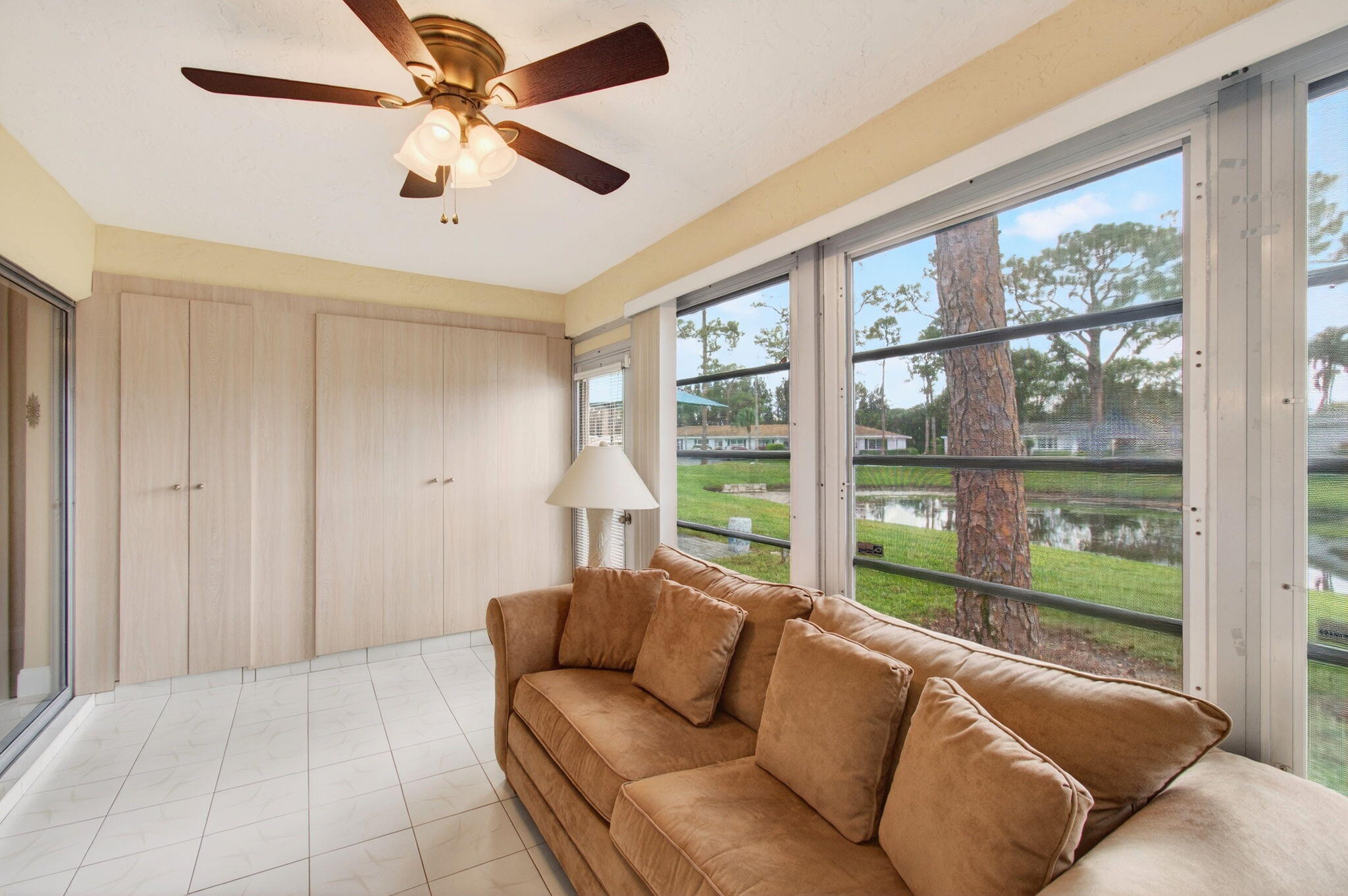 5263 Privet Place, Unit D Delray Beach, FL 33484 - Photo 20 of 60 a living room with furniture and a window