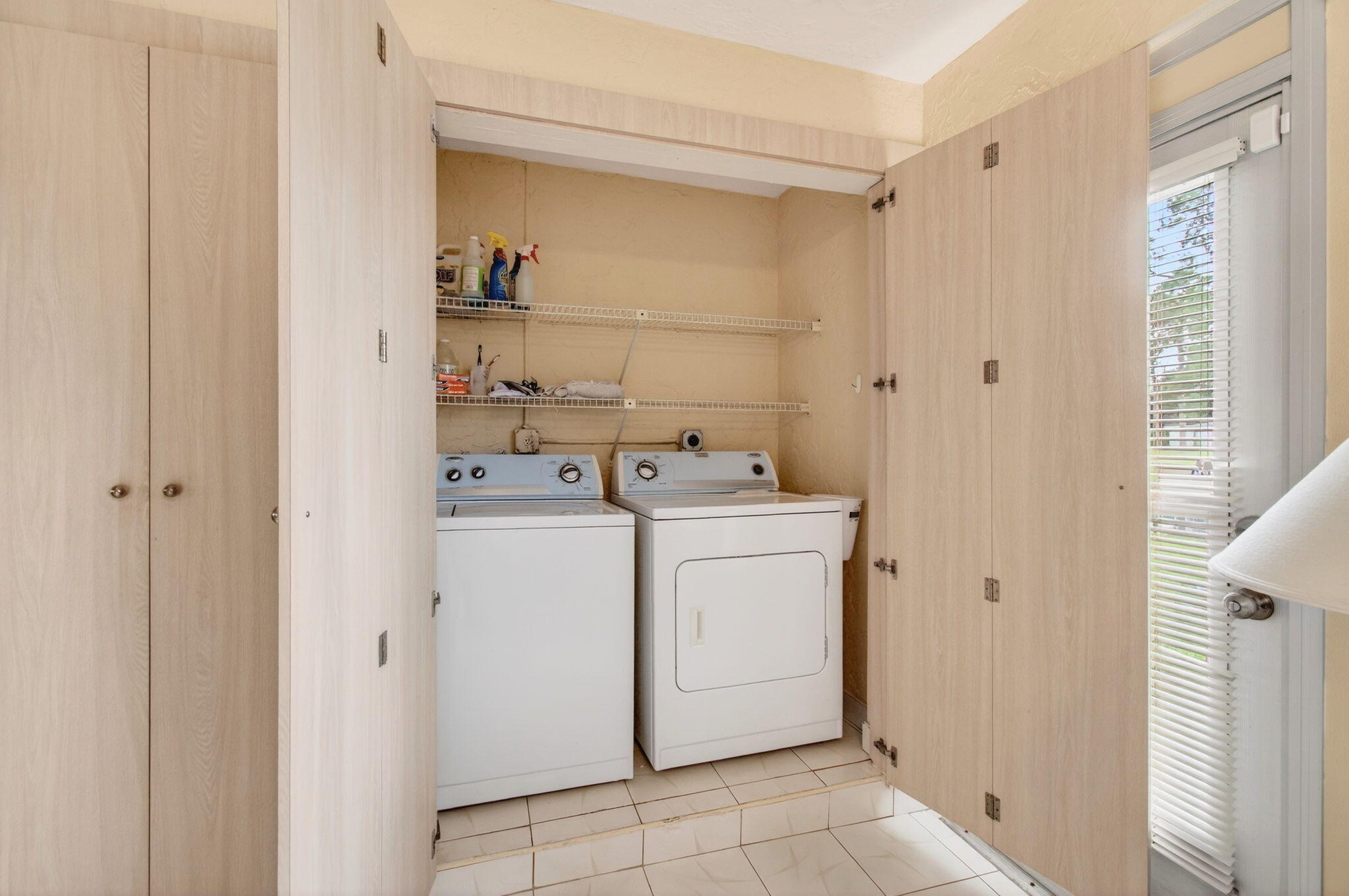 5263 Privet Place, Unit D Delray Beach, FL 33484 - Photo 21 of 60 a utility room with dryer and washer