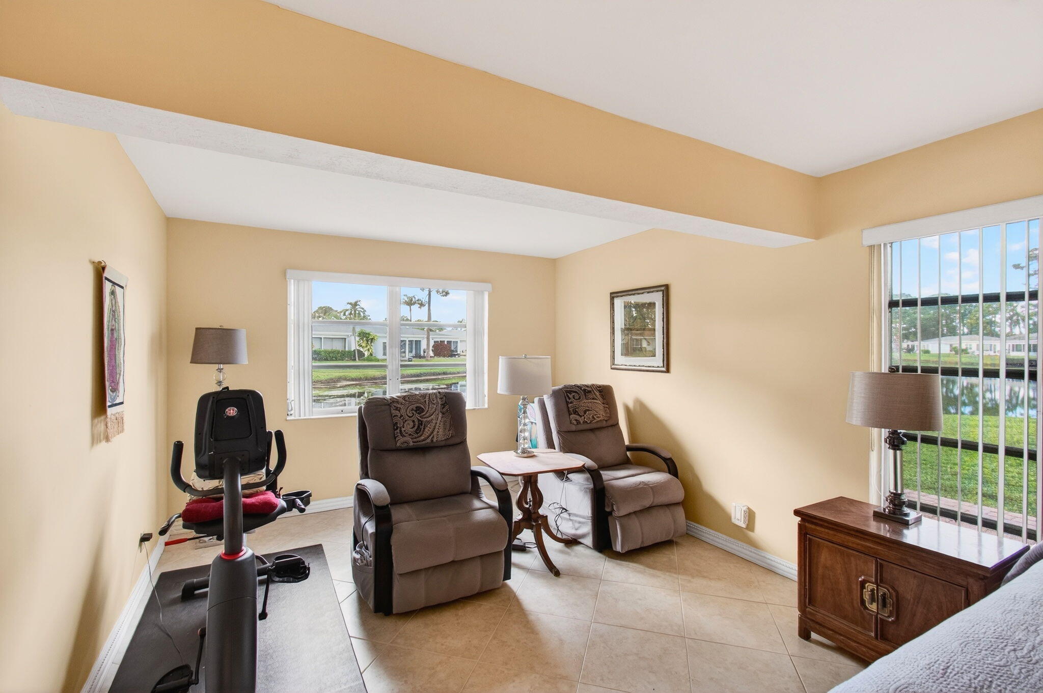 5263 Privet Place, Unit D Delray Beach, FL 33484 - Photo 27 of 60 a living room with furniture and a window