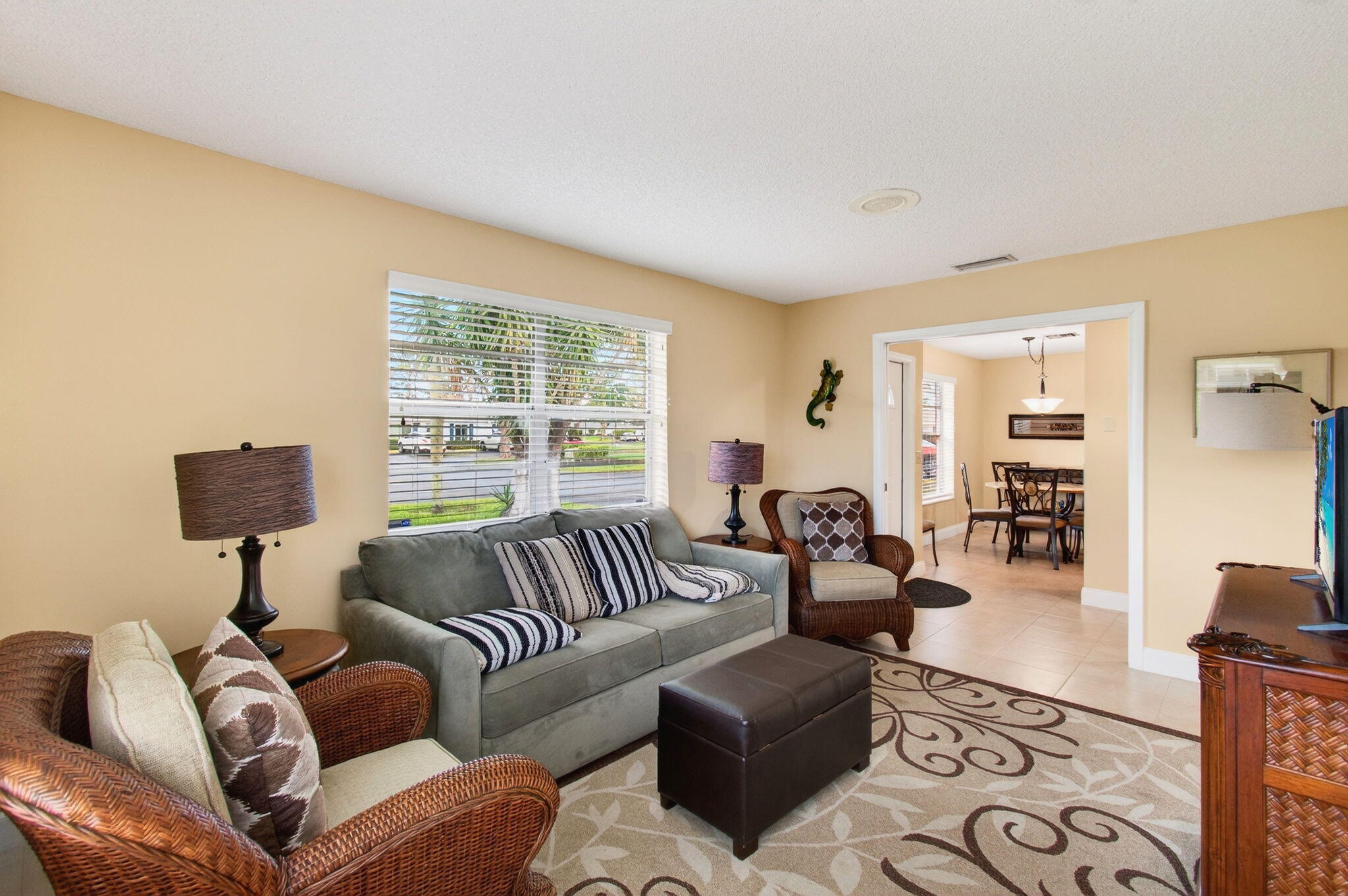5263 Privet Place, Unit D Delray Beach, FL 33484 - Photo 34 of 60 a living room with furniture or couch and a window