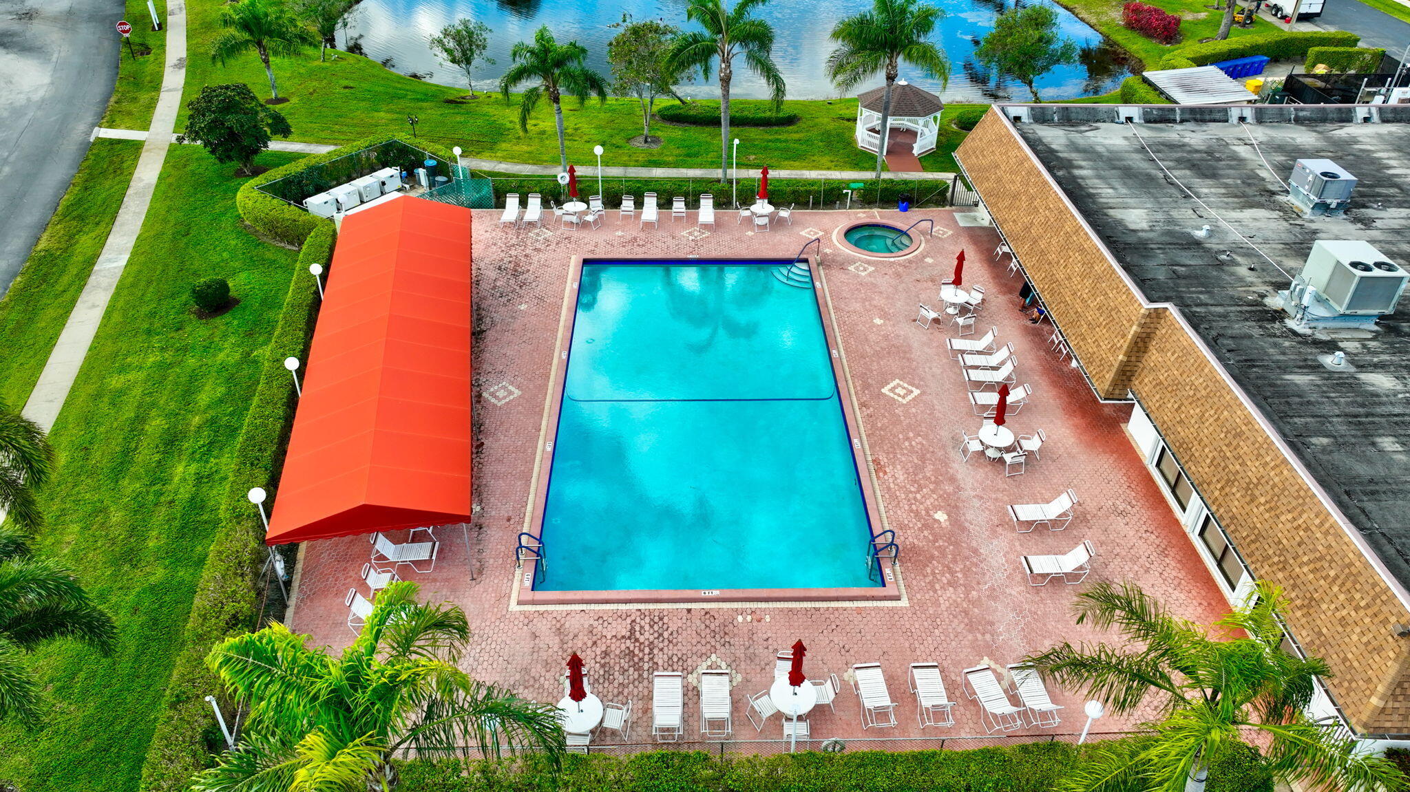 5263 Privet Place, Unit D Delray Beach, FL 33484 - Photo 55 of 60 a view of swimming pool with a yard