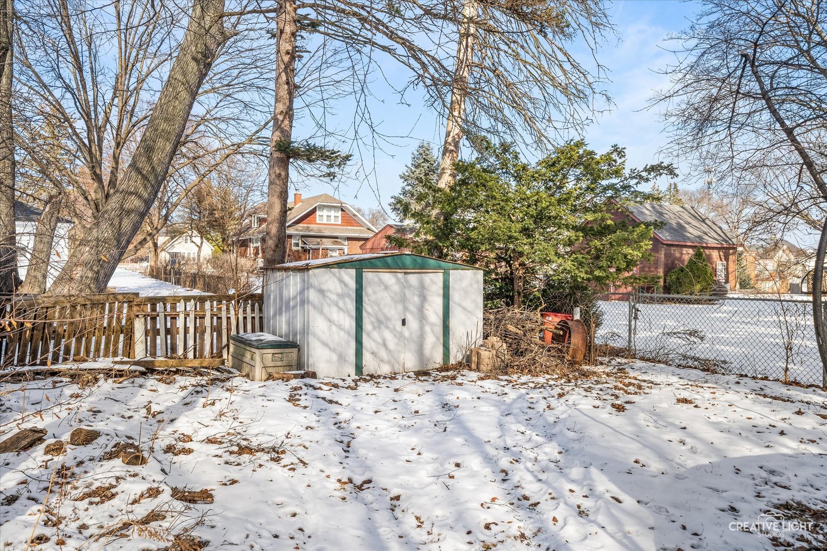523 Preston Avenue Elgin, IL 60120 - Photo 18 of 22 a backyard of a house with lots of green space