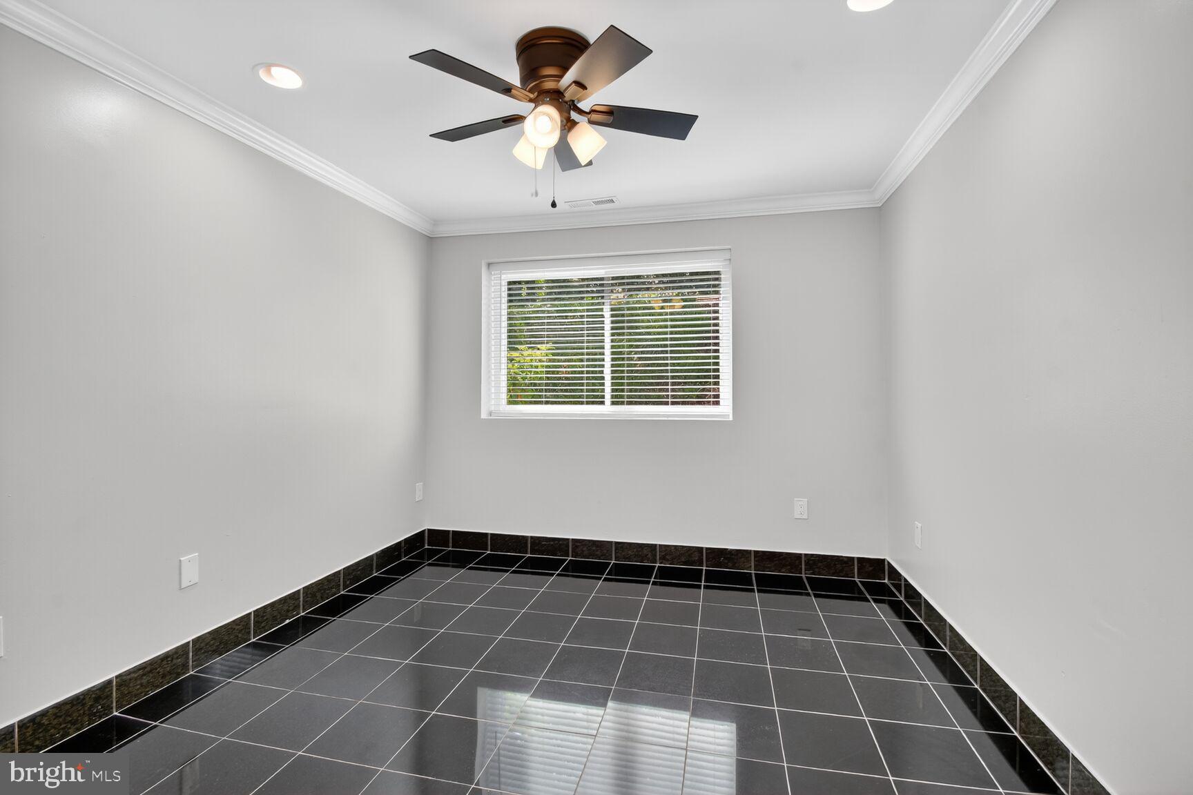 3976 Bel Pre Road, Unit 1 Silver Spring, MD 20906 - Photo 12 of 19 a view of an empty room with a window