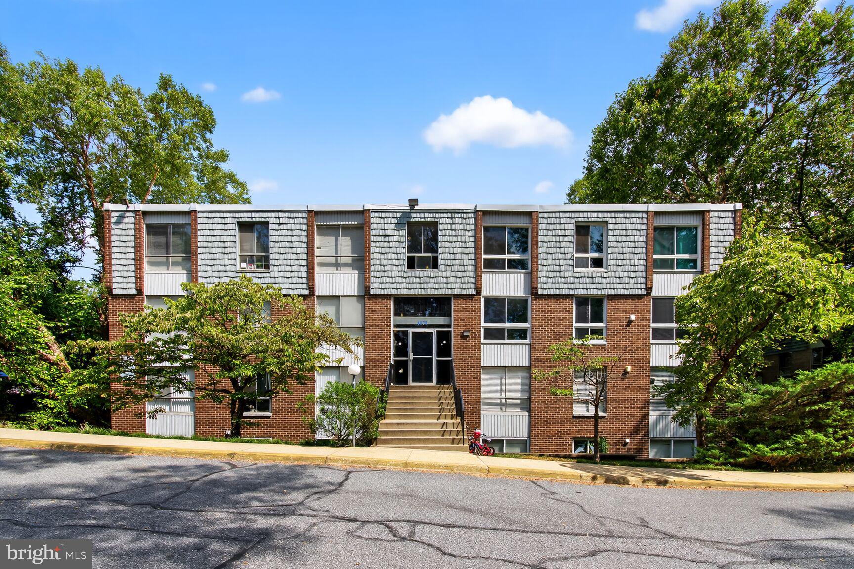 3976 Bel Pre Road, Unit 39761 Silver Spring, MD 20906 - Photo 19 of 19 a front view of house with yard