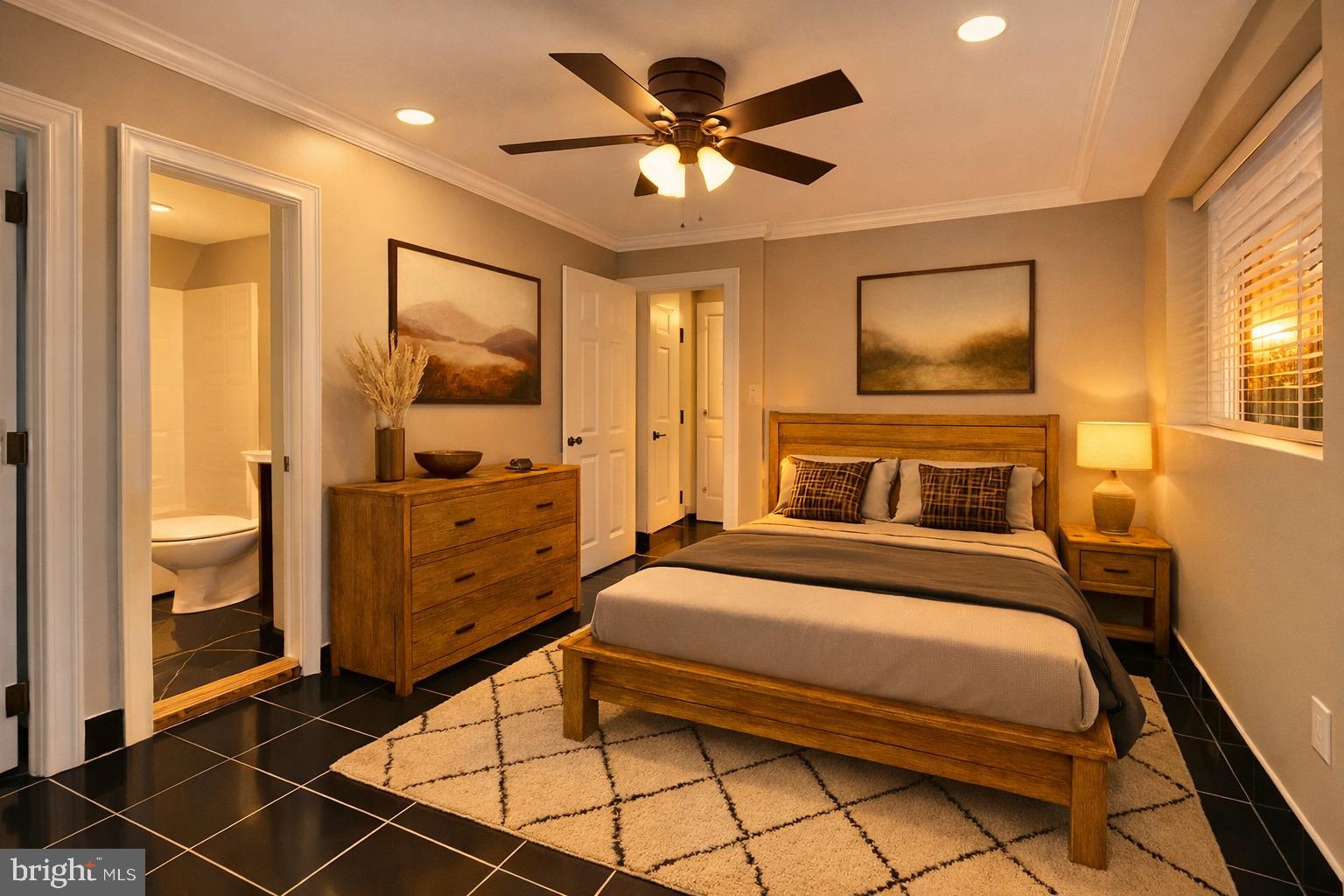 3976 Bel Pre Road, Unit 1 Silver Spring, MD 20906 - Photo 8 of 19 a bedroom with a bed and a chandelier