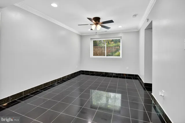 a view of a hallway with a window