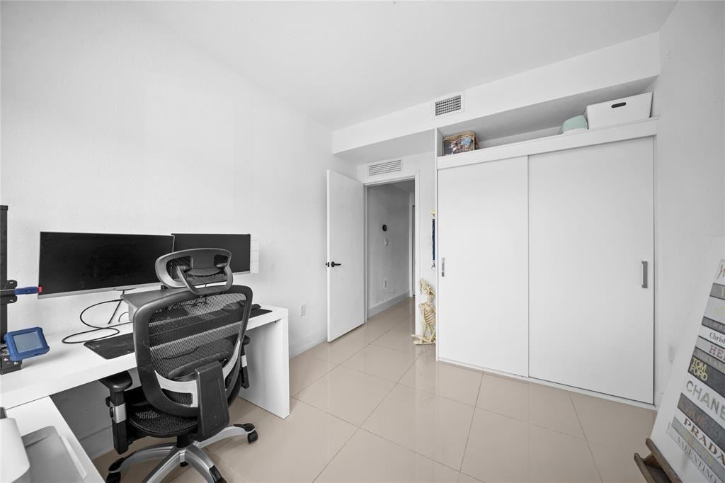 14474 Southwest 259th Street Homestead, FL 33032 - Photo 13 of 25 a view of a workspace with furniture