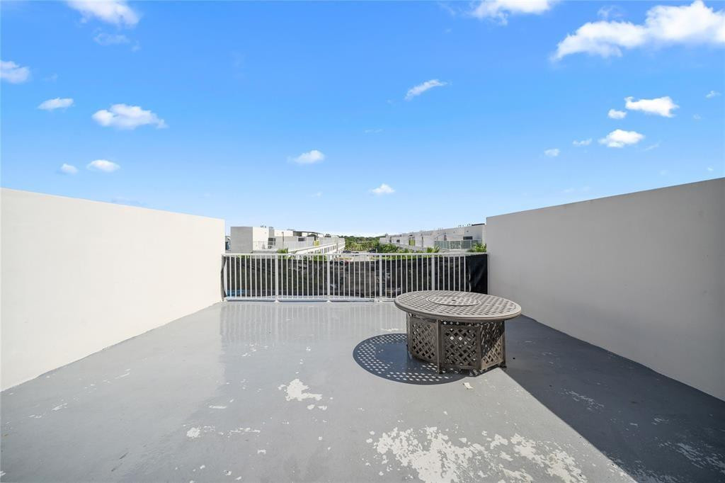 14474 Southwest 259th Street Homestead, FL 33032 - Photo 19 of 25 a living room with furniture a sink and a potted plant