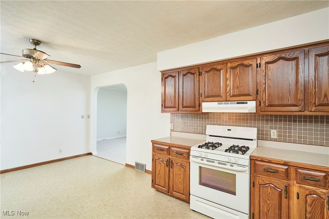 415 West Waterloo Road Akron, OH 44314 - Photo 12 of 24 KITCHEN OPENS TO LIVING ROOM