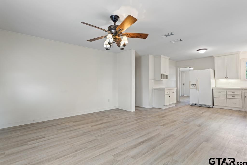 107 Mallory Street Lindale, TX 75771 - Photo 17 of 33 a view of an empty room with a window