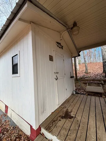 a view of a storage & utility room with two washing machine