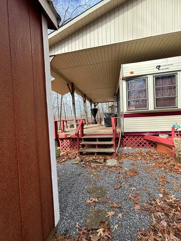 a view of entryway with wooden floor