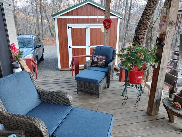 a backyard of a house with lots of trees
