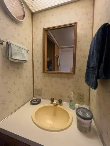a bathroom with a tub and shower