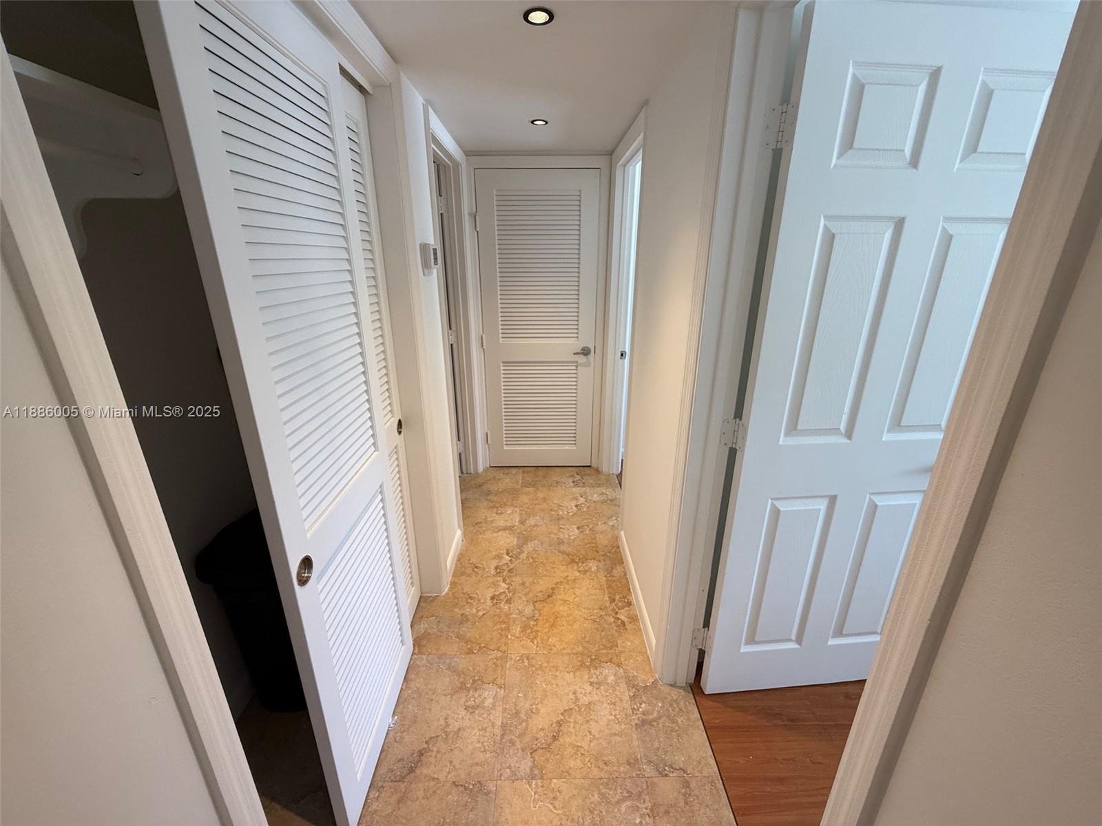 1500 Bay Road, Unit 122S Miami Beach, FL 33139 - Photo 12 of 44 a view of a hallway
