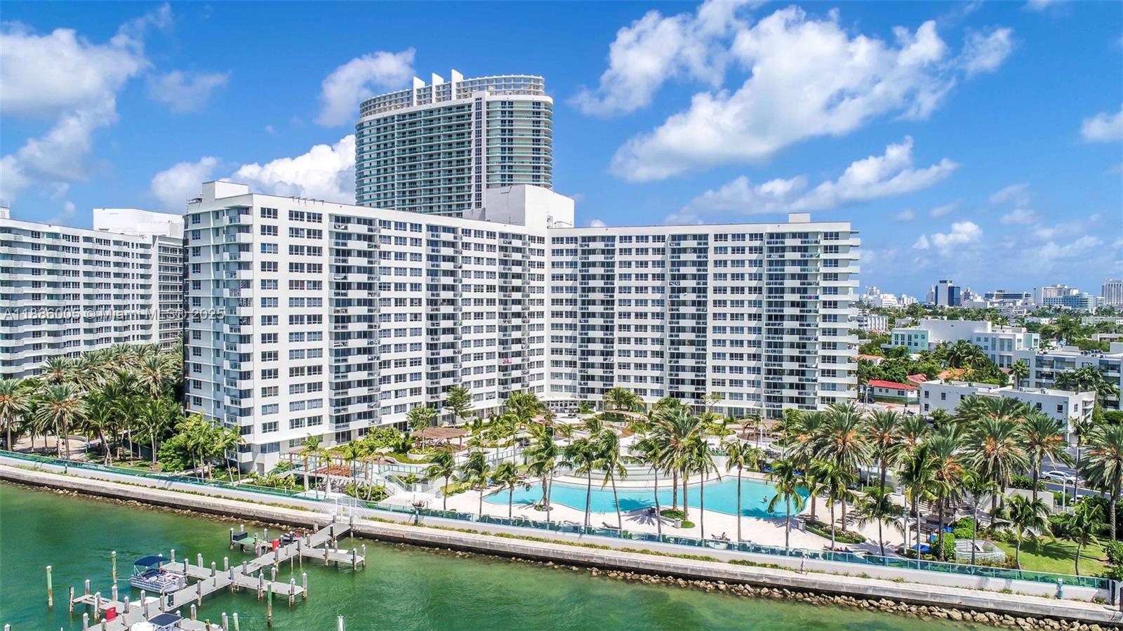 1500 Bay Road, Unit 122S Miami Beach, FL 33139 - Photo 3 of 44 a view of a city with tall buildings