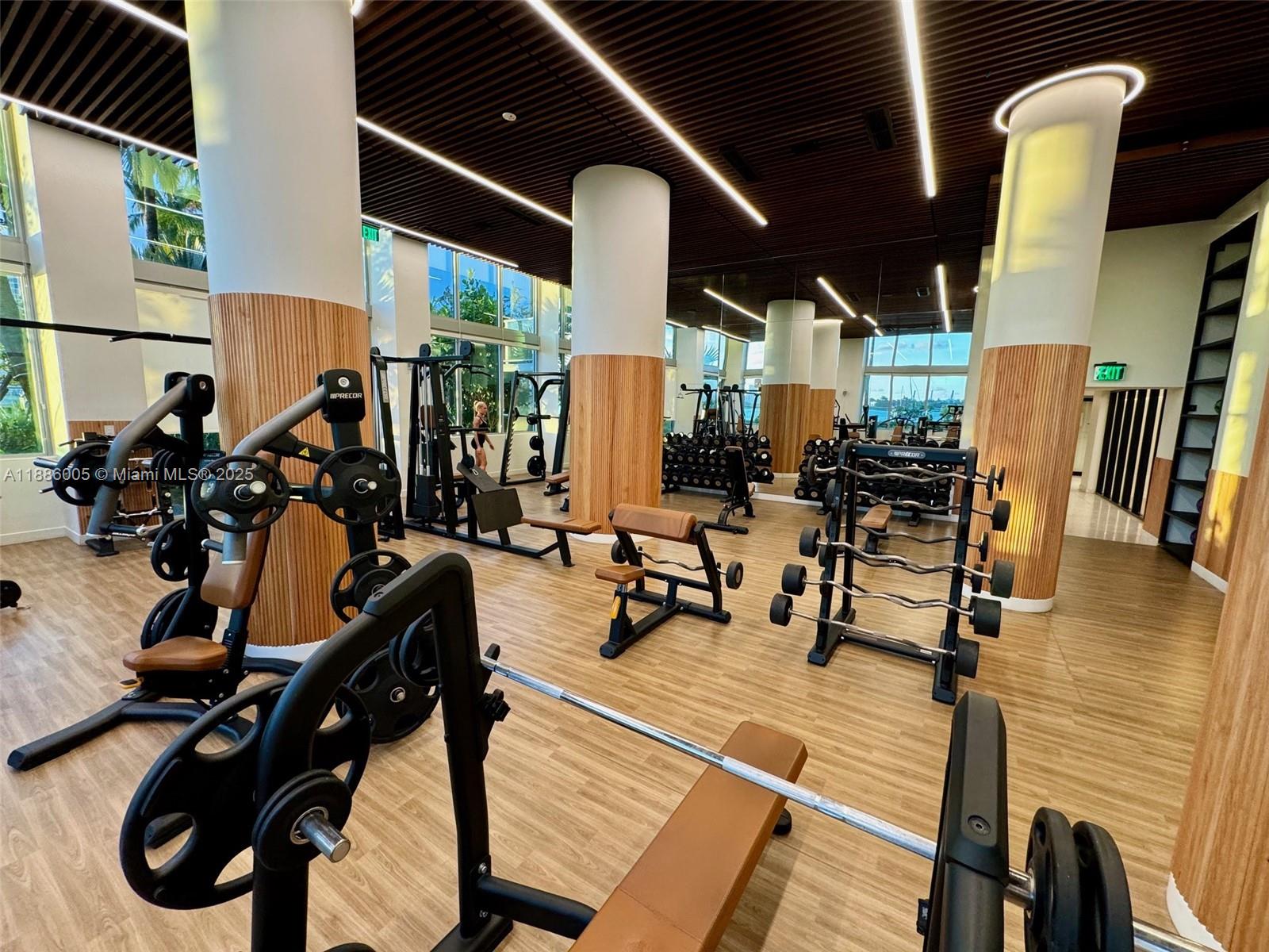 1500 Bay Road, Unit 122S Miami Beach, FL 33139 - Photo 32 of 44 a view of a room with gym equipment