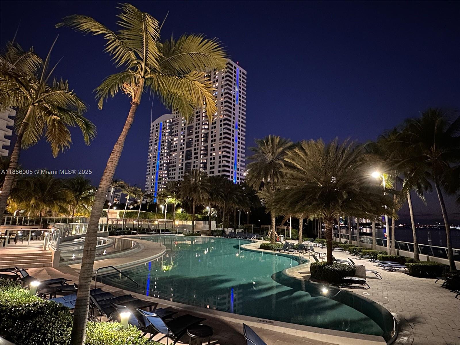 1500 Bay Road, Unit 122S Miami Beach, FL 33139 - Photo 33 of 44 a view of a yard with cars