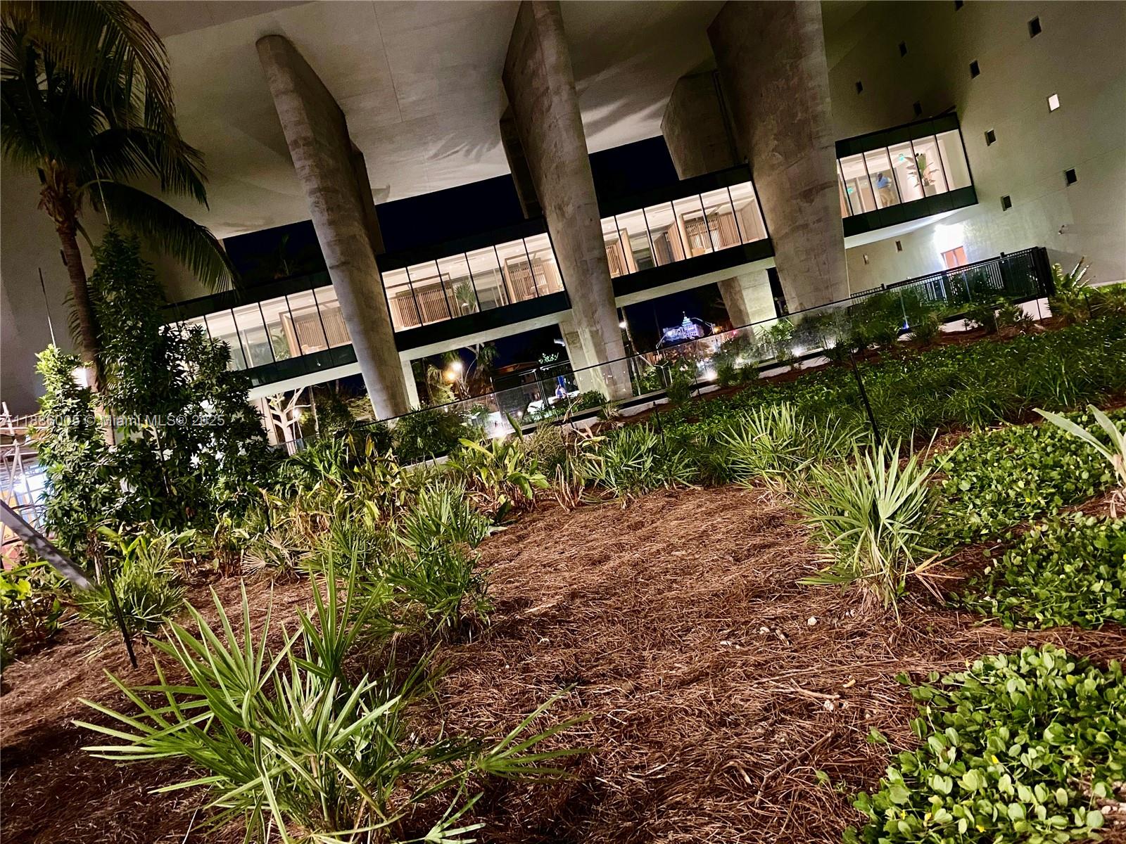 1500 Bay Road, Unit 122S Miami Beach, FL 33139 - Photo 42 of 44 a view of a street with lots of flower plants
