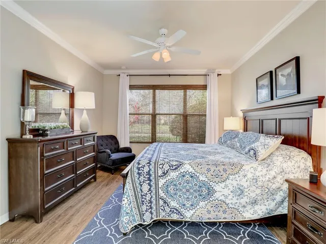 a spacious bathroom with a bathtub sink and mirror