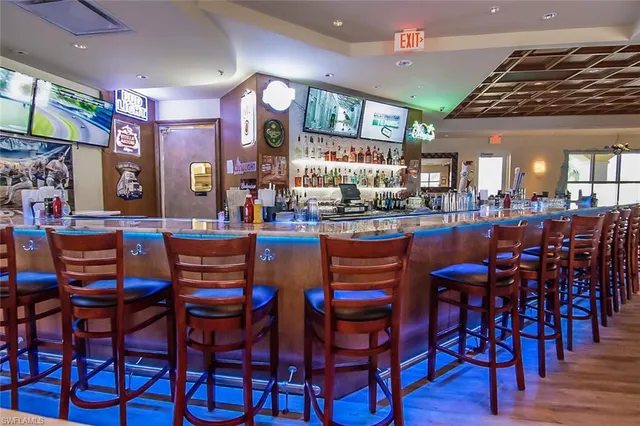 a view of a swimming pool with a yard