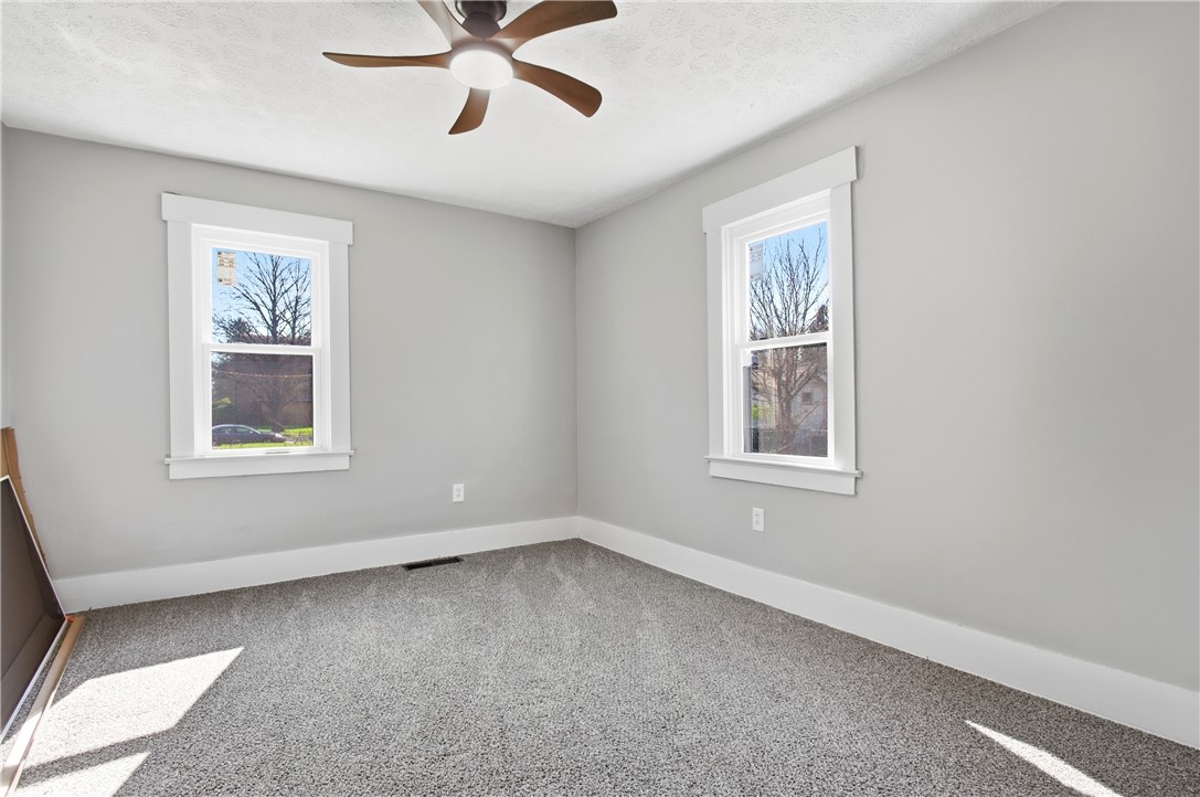 1925 Sunset Avenue Springfield, OH 45505 - Photo 27 of 45 Bright and airy room with large windows and plush carpeting.