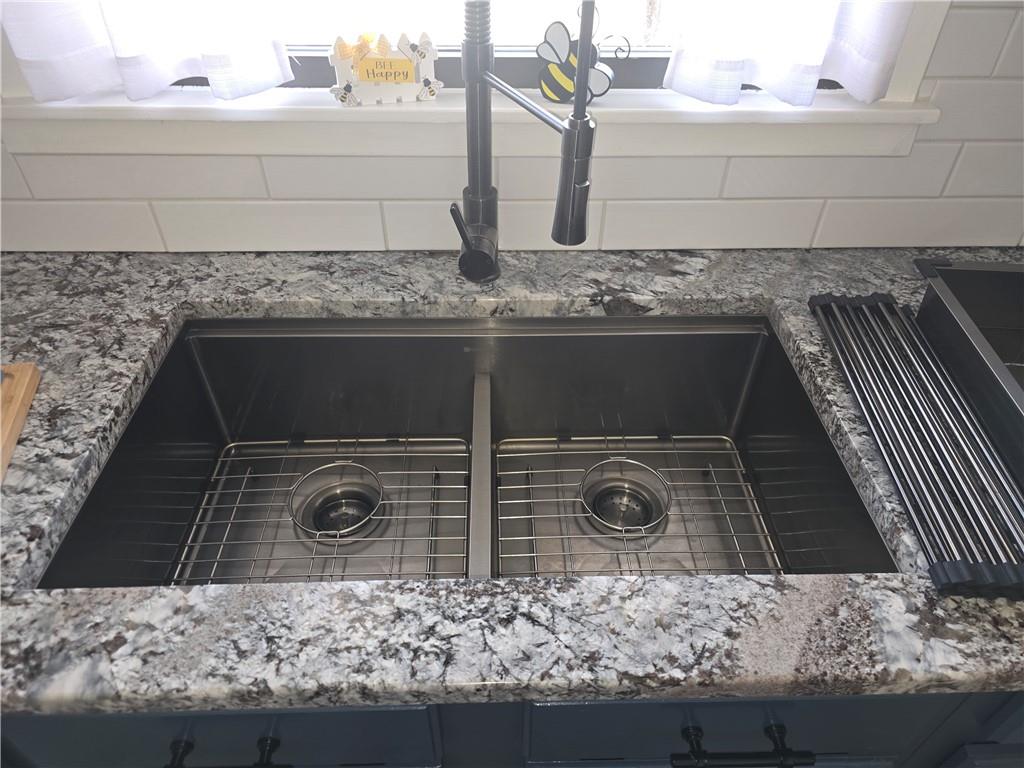 141 Hall Road Slippery Rock, PA 16057 - Photo 11 of 28 a bathroom with a granite countertop sink and a mirror