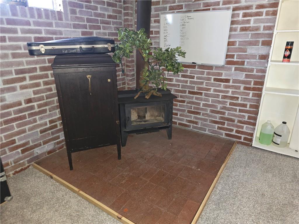 141 Hall Road Slippery Rock, PA 16057 - Photo 21 of 28 a view of a door and chair in the room