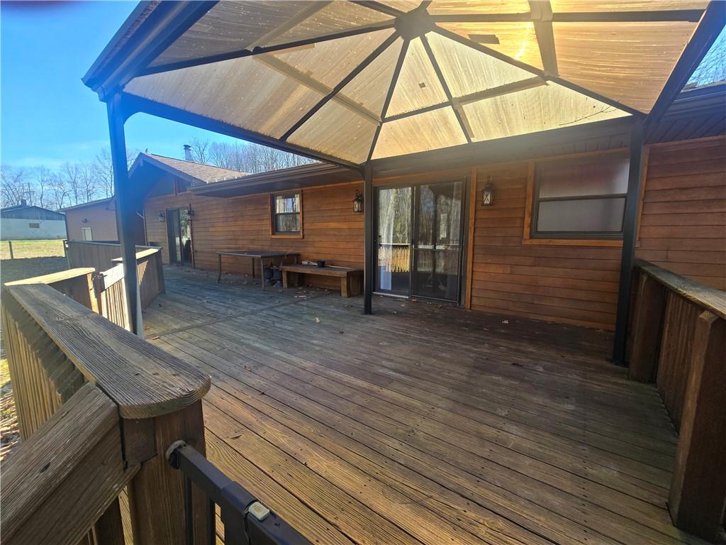 141 Hall Road Slippery Rock, PA 16057 - Photo 26 of 28 a view of a backyard with a chair and table