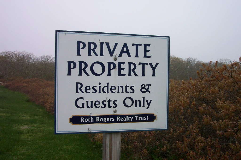 74 Rustling Oaks Road West Tisbury, MA 02568 - Photo 2 of 3 a sign broad on the wall