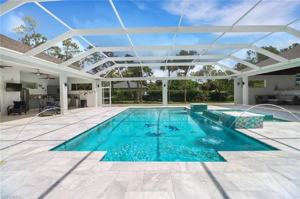 1086 21st Street Southwest Naples, FL 34117 - Photo 34 of 50 a view of a backyard of a house