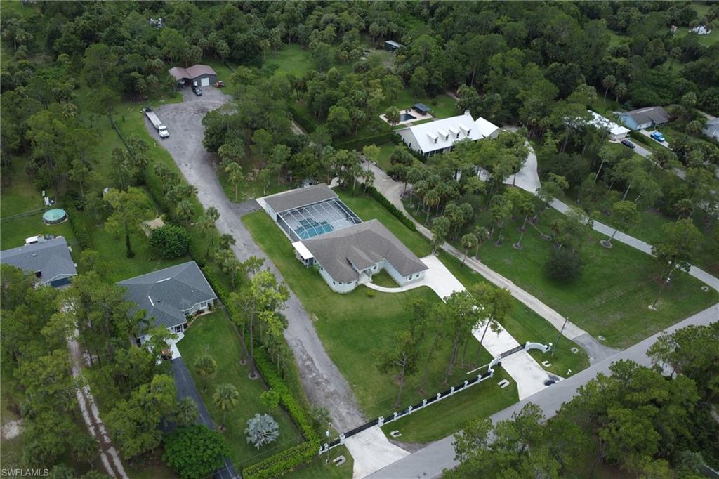 1086 21st Street Southwest Naples, FL 34117 - Photo 43 of 50 an aerial view of a city