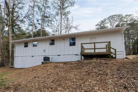 a house view with a backyard space