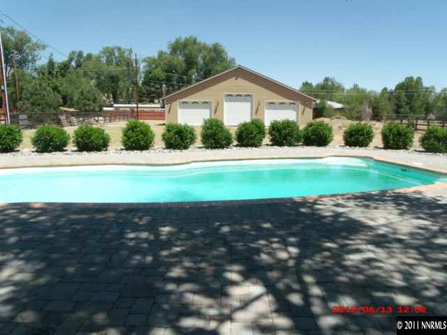 4875 Hilton Court Reno, NV 89519 - Photo 1 of 1 a view of a house with a yard