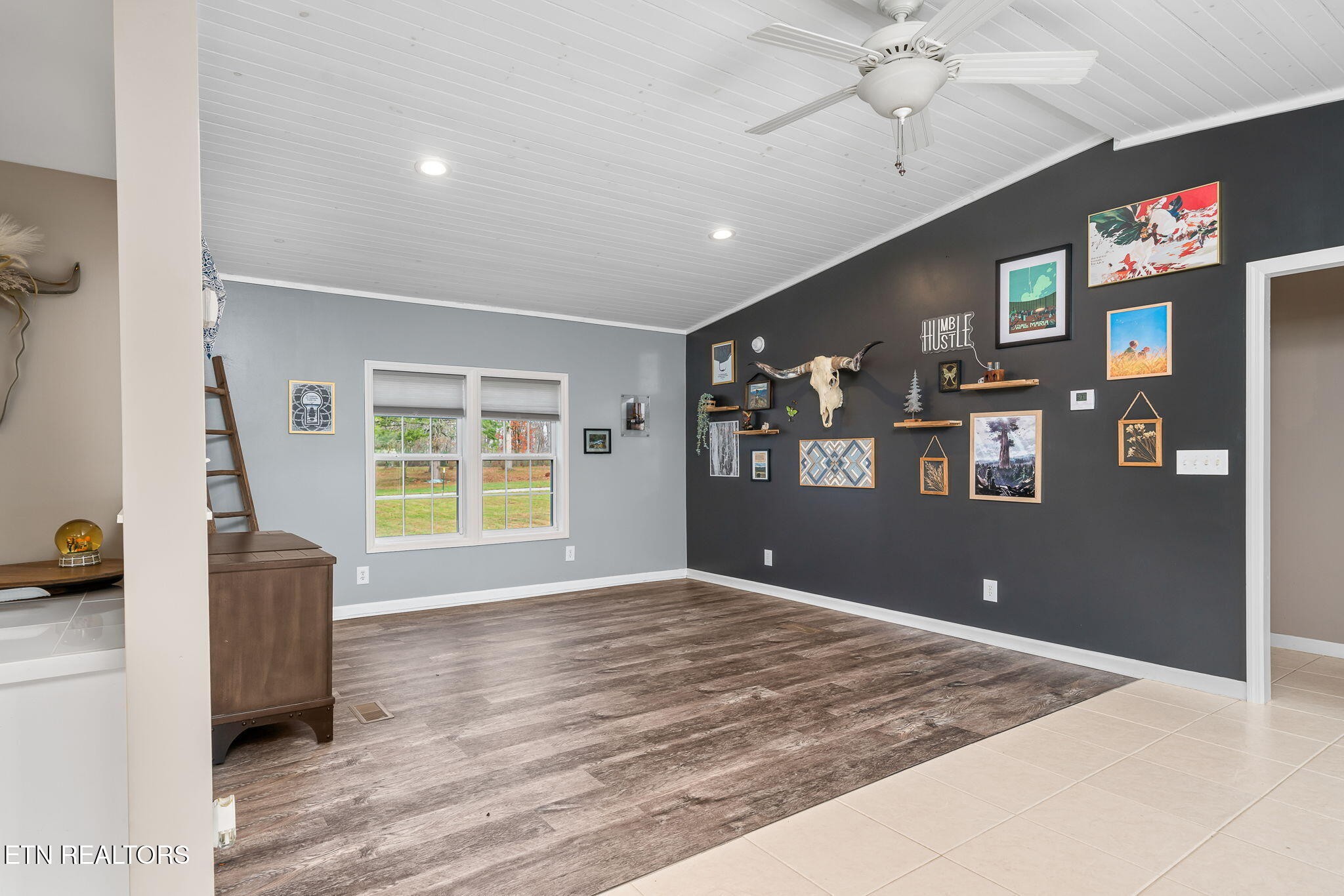 219 North Lowe Road Crossville, TN 38571 - Photo 17 of 34 a view of livingroom with hardwood floor and ceiling fan