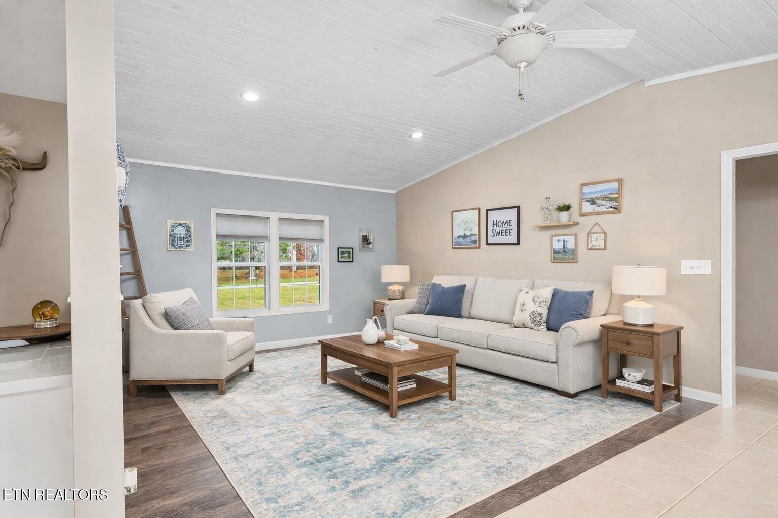 219 North Lowe Road Crossville, TN 38571 - Photo 18 of 34 a living room with furniture and a large window