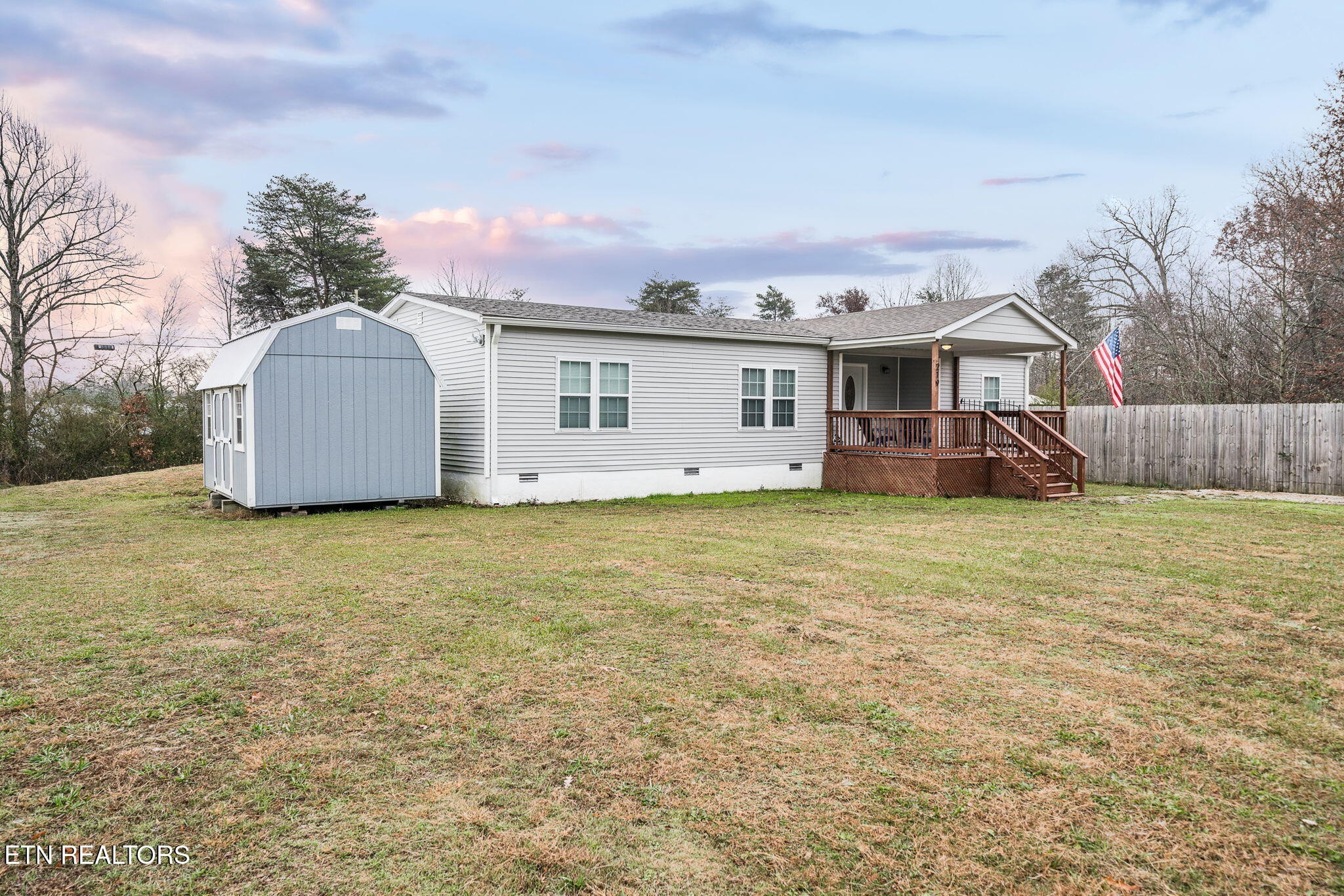 219 North Lowe Road Crossville, TN 38571 - Photo 3 of 34 a front view of a house with garden