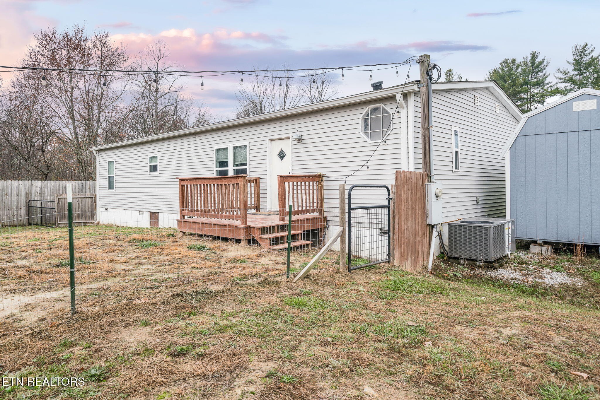219 North Lowe Road Crossville, TN 38571 - Photo 4 of 34 a view of a house with a backyard and a chair