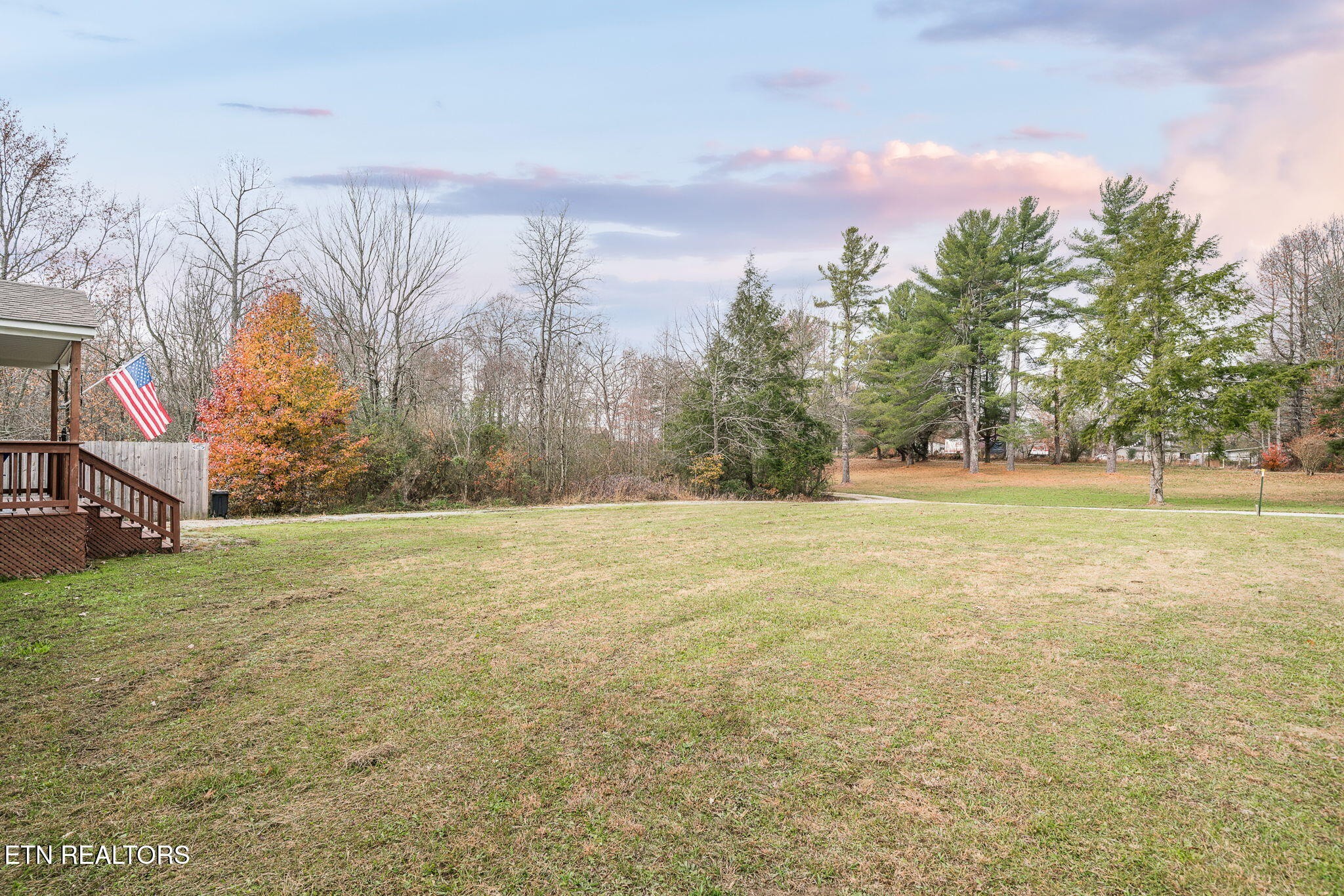 219 North Lowe Road Crossville, TN 38571 - Photo 9 of 34 a view of a field with trees in the background