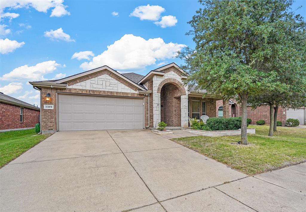 1109 Bent Tree Road Royse City, TX 75189 - Photo 1 of 1 a front view of a house with garden