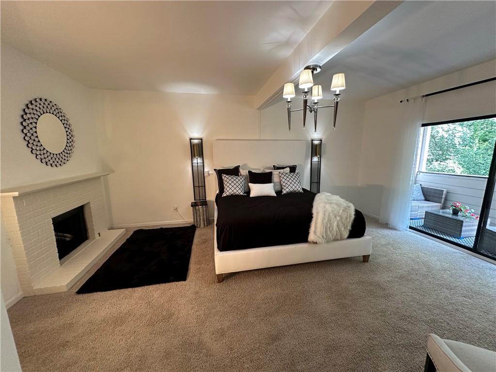 3823 Paces Ferry West Atlanta, GA 30339 - Photo 17 of 33 a living room with furniture and a fireplace