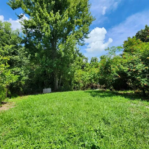 a view of an outdoor space and a yard