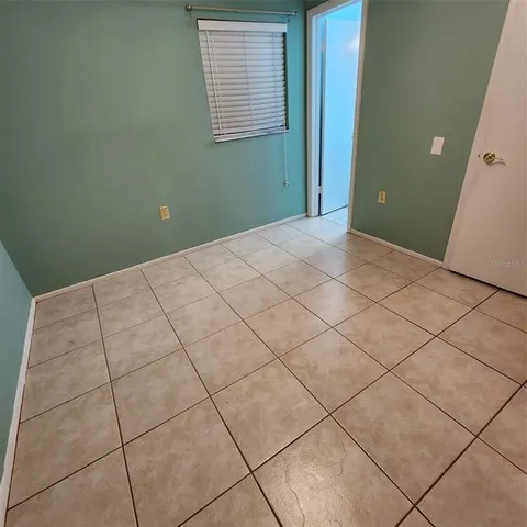 a view of a room with windows