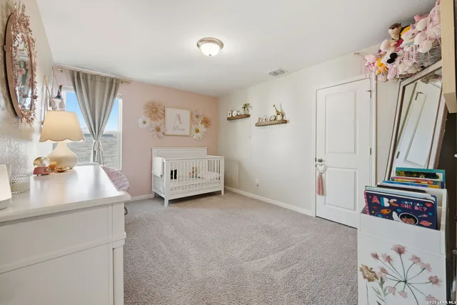 a bathroom with a sink toilet and a mirror