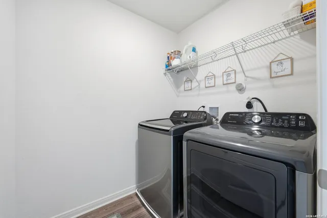 a utility room with dryer and washer